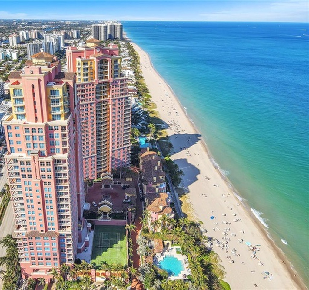 Aerial view of The Palms twin pink towers on Fort Lauderdale beach